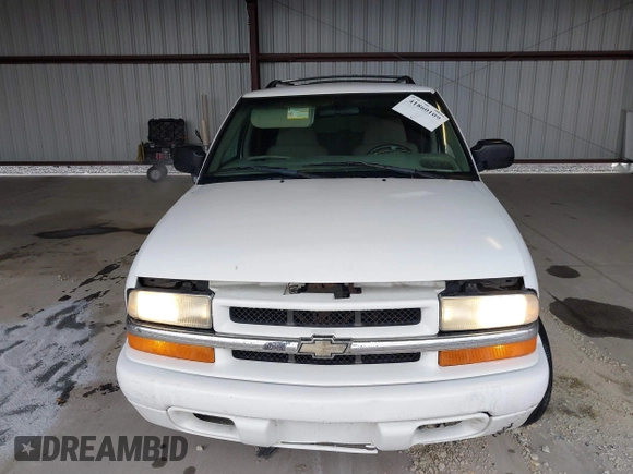 2004 Chevrolet Blazer LS z VIN 1GNDT13X64K129093, wystawiony jako IAAI lot #41860109 z przebiegiem 175 588 mil mil oraz . Historia ofert i sprzedaży dostępna na DreamBid. Obrazek 12.