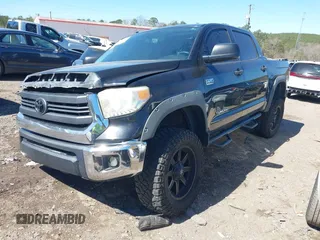 2014 Toyota Tundra 4WD Truck SR5 with VIN 5TFDW5F15EX337114, listed as a IAAI auction lot 41734727 with 209,163 mi miles. Bid and sale history available at carsss.com. Image 2.