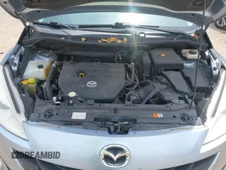 2012 Mazda 5 Sport with VIN JM1CW2BLXC0106748, listed as a IAAI auction lot 42435965 with 153,786 mi miles and . Bid and sale history available at DreamBid. Image 10.