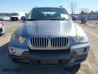 2007 BMW X5 3.0si with VIN 5UXFE43557L011481, listed as a IAAI auction lot 41764468 with 116,770 mi miles. Bid and sale history available at carsss.com. Image 13.