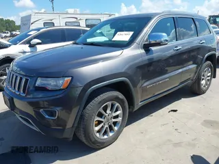 2014 Jeep Grand Cherokee Limited with VIN 1C4RJFBT0EC241030, listed as a IAAI auction lot 42617051 with 104,370 mi miles and . Bid and sale history available at DreamBid. Image 2.