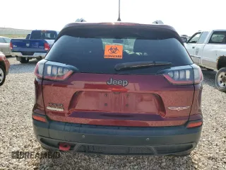 2020 Jeep Cherokee Trailhawk Elite z VIN 1C4PJMBN4LD549550, wystawiony jako Copart lot #64161064 z przebiegiem Nie podano mil oraz Szkoda całkowita • Salvage title. Historia ofert i sprzedaży dostępna na DreamBid. Obrazek 6.
