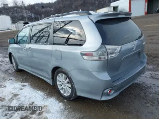 2013 Toyota Sienna SE with VIN 5TDXK3DC0DS354540, listed as a IAAI auction lot 41445501 with 238,814 mi miles and . Bid and sale history available at DreamBid. Image 3.