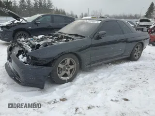 1991 Nissan Skyline z VIN BNR32016641, wystawiony jako Copart lot #87935775 z przebiegiem 166 776 mil mil oraz Szkoda całkowita • Salvage title. Historia ofert i sprzedaży dostępna na DreamBid. Obrazek 1.