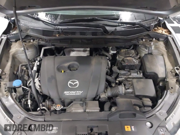 2016 Mazda CX-5 Sport with VIN JM3KE2BY2G0718434, listed as a IAAI auction lot 41961364 with 145,748 mi miles. Bid and sale history available at carsss.com. Image 10.