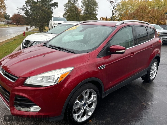 2014 Ford Escape Titanium with VIN 1FMCU0JX8EUC19300, listed as a Copart auction lot 79009664 with 111,705 mi miles and Clean Title. Bid and sale history available at carsss.com. Image 2.
