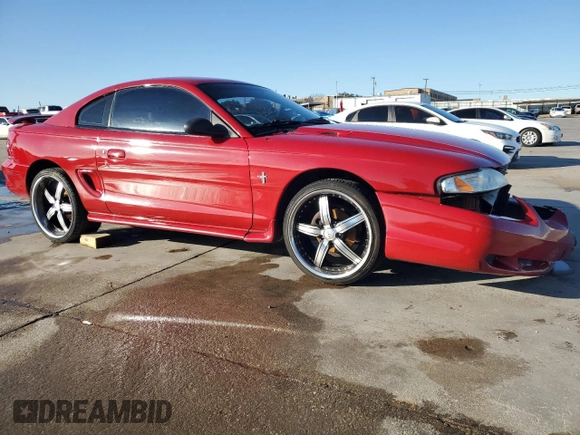 1996 Ford Mustang with VIN 1FALP4041TF234741, listed as a Copart auction lot 85277894 with 113,353 mi miles and Salvage Title. Bid and sale history available at carsss.com. Image 4.