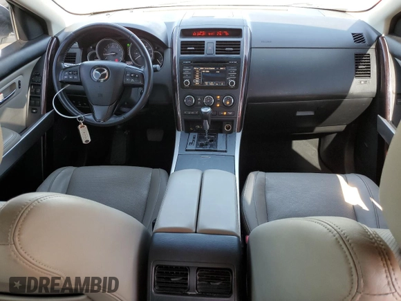 2014 Mazda CX-9 Grand Touring with VIN JM3TB3DA5E0431539, listed as a Copart auction lot 62418005 with 139,686 mi miles and Salvage title. Bid and sale history available at DreamBid. Image 8.