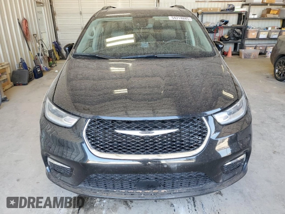 2022 Chrysler Pacifica Touring L with VIN 2C4RC1BG3NR195099, listed as a Copart auction lot 54214885 with 69,039 mi miles and Salvage title. Bid and sale history available at DreamBid. Image 5.