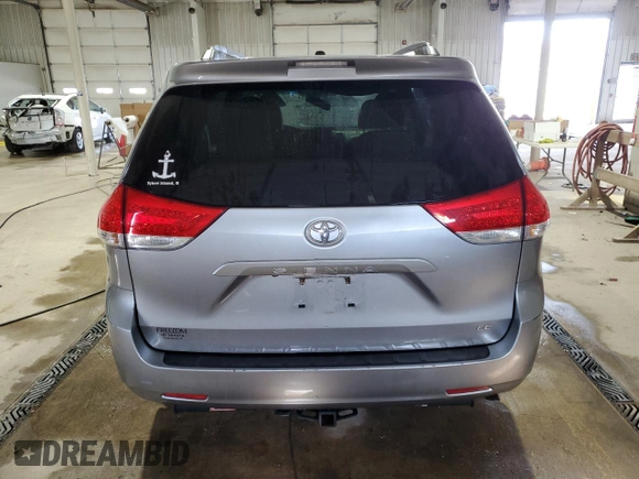 2012 Toyota Sienna LE AAS with VIN 5TDKK3DC6CS264818, listed as a Copart auction lot 52145145 with 143,510 mi miles and Salvage Title. Bid and sale history available at carsss.com. Image 6.
