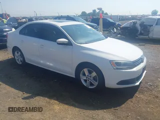 2014 Volkswagen Jetta TDI w/Premium/Nav with VIN 3VWLL7AJXEM366828, listed as a IAAI auction lot 42392563 with 132,924 mi miles and . Bid and sale history available at DreamBid. Image 1.