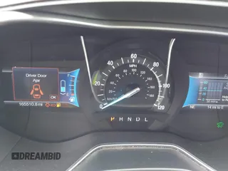 2016 Ford Fusion SE Hybrid with VIN 3FA6P0LU5GR235241, listed as a IAAI auction lot 41697504 with 165,510 mi miles. Bid and sale history available at carsss.com. Image 15.