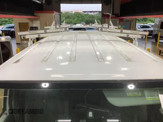 2013 Ford Econoline Cargo Commercial with VIN 1FTNE1EW9DDA61968, listed as a IAAI auction lot 42643038 with 121,719 mi miles and . Bid and sale history available at DreamBid. Image 32.