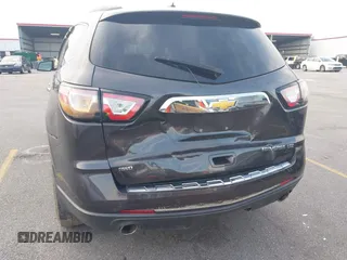 2015 Chevrolet Traverse LTZ with VIN 1GNKVJKDXFJ206159, listed as a IAAI auction lot 41762515 with 143,062 mi miles and . Bid and sale history available at DreamBid. Image 6.