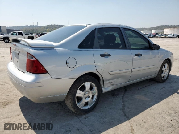 2007 Ford Focus S with VIN 1FAHP34N77W364581, listed as a Copart auction lot 52179835 with 111,701 mi miles and Salvage Title. Bid and sale history available at carsss.com. Image 3.