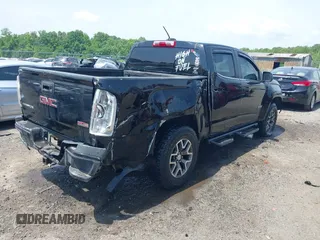2016 GMC Canyon 4WD SLE z VIN 1GTG6CE35G1171168, wystawiony jako IAAI lot #42275447 z przebiegiem 171 581 mil mil oraz . Historia ofert i sprzedaży dostępna na DreamBid. Obrazek 4.