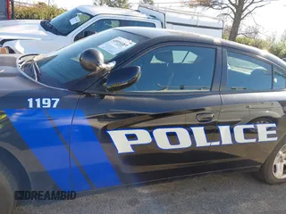 2022 Dodge Charger Police with VIN 2C3CDXAT3NH109952, listed as a IAAI auction lot 40919989 with 19,169 mi miles and . Bid and sale history available at DreamBid. Image 14.