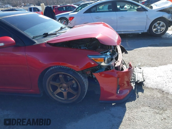 2016 Scion tC with VIN JTKJF5C77GJ026150, listed as a IAAI auction lot 41424088 with 96,370 mi miles. Bid and sale history available at carsss.com. Image 19.