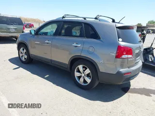 2013 Kia Sorento EX with VIN 5XYKU4A25DG411785, listed as a IAAI auction lot 42204291 with 203,501 mi miles and . Bid and sale history available at carsss.com. Image 3.
