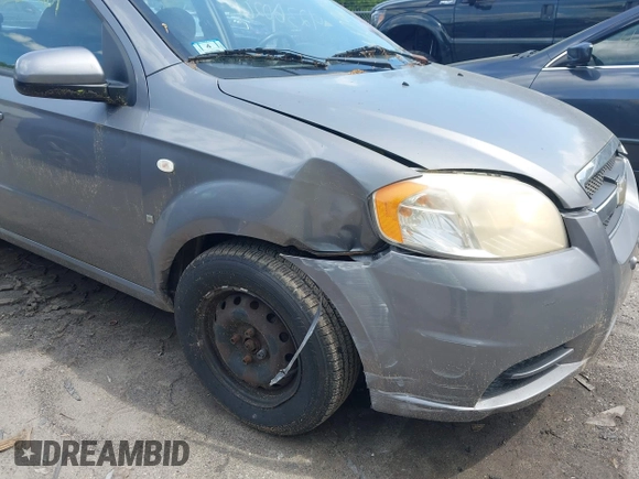 2007 Chevrolet Aveo LS z VIN KL1TD56687B061158, wystawiony jako IAAI lot #42360261 z przebiegiem 74 079 mil mil oraz . Historia ofert i sprzedaży dostępna na DreamBid. Obrazek 6.