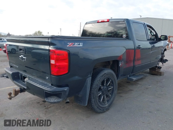 2017 Chevrolet Silverado 1500 LT with VIN 3GCUKREC7HG220780, listed as a IAAI auction lot 41978463 with 131,532 mi miles and . Bid and sale history available at DreamBid. Image 4.
