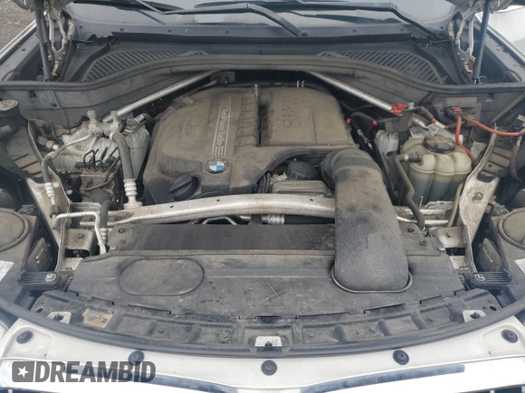 2017 BMW X5 xDrive35i with VIN 5UXKR0C56H0V68771, listed as a Copart auction lot 59587015 with 164,990 mi miles and Salvage title. Bid and sale history available at DreamBid. Image 11.