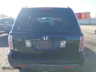 2006 Honda Pilot EX-L with VIN 5FNYF28586B037160, listed as a IAAI auction lot 41798991 with 207,486 mi miles. Bid and sale history available at carsss.com. Image 16.