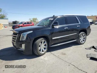 2019 Cadillac Escalade Luxury with VIN 1GYS4BKJ7KR138514, listed as a Copart auction lot 54334995 with 77,127 mi miles and Salvage title. Bid and sale history available at DreamBid. Image 1.
