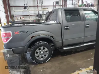 2011 Ford F-150 XLT with VIN 1FTFW1ET4BFB50467, listed as a IAAI auction lot 41608114 with 201,858 mi miles. Bid and sale history available at carsss.com. Image 4.