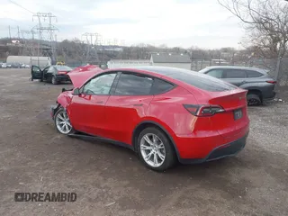 2022 Tesla Model Y Long Range with VIN 7SAYGDEE1NF442159, listed as a IAAI auction lot 41674506 with 82,355 mi miles and . Bid and sale history available at DreamBid. Image 3.