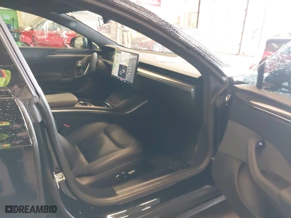 2021 Tesla Model S Plaid with VIN 5YJSA1E63MF433666, listed as a IAAI auction lot 41384955 with 31,760 mi miles. Bid and sale history available at carsss.com. Image 5.