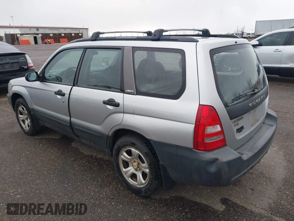 2003 Subaru Forester X with VIN JF1SG63633G728520, listed as a IAAI auction lot 41808658 with 104,084 mi miles. Bid and sale history available at carsss.com. Image 3.