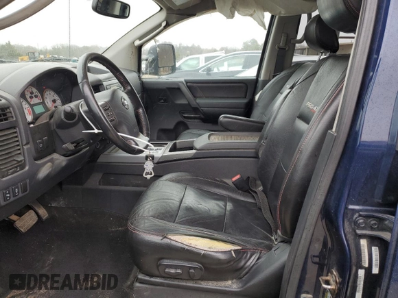 2011 Nissan Titan Pro-4X z VIN 1N6BA0EC0BN322228, wystawiony jako Copart lot #47617305 z przebiegiem 189 151 mil mil oraz Szkoda całkowita • Salvage title. Historia ofert i sprzedaży dostępna na DreamBid. Obrazek 7.