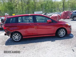 2012 Mazda 5 Grand Touring with VIN JM1CW2DL1C0123418, listed as a IAAI auction lot 42126956 with 112,411 mi miles and . Bid and sale history available at DreamBid. Image 13.