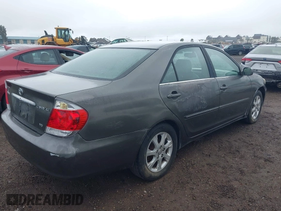 2005 Toyota Camry LE with VIN 4T1BF32K25U595176, listed as a IAAI auction lot 41932171 with 203,956 mi miles and . Bid and sale history available at DreamBid. Image 4.