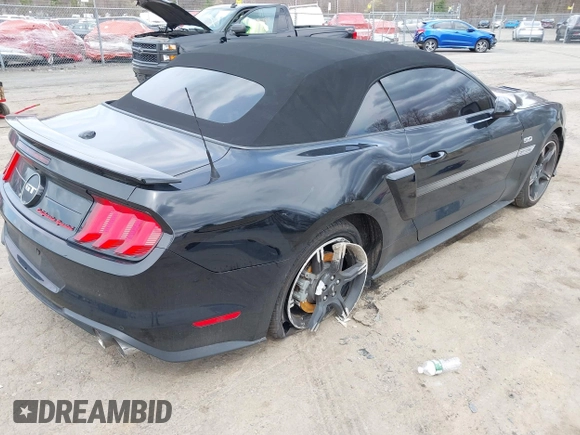 2021 Ford Mustang GT Premium with VIN 1FATP8FF4M5143096, listed as a IAAI auction lot 42013344 with 20,221 mi miles and . Bid and sale history available at DreamBid. Image 4.