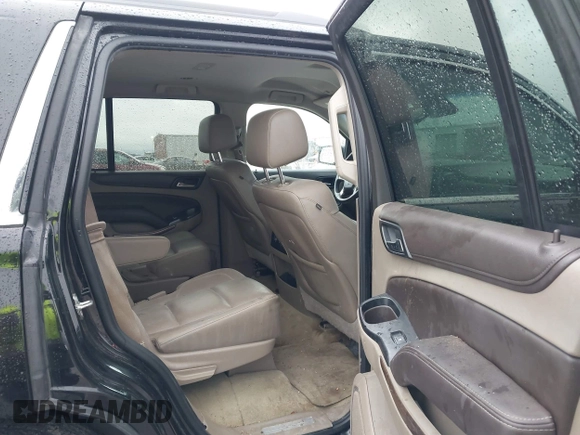 2015 Chevrolet Tahoe LT with VIN 1GNSCBKC2FR632139, listed as a IAAI auction lot 41553087 with 142,775 mi miles and . Bid and sale history available at DreamBid. Image 8.