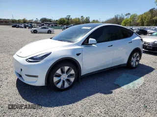2021 Tesla Model Y Standard Range with VIN 5YJYGDED8MF113011, listed as a Copart auction lot 48774825 with 30,562 mi miles and Salvage Title. Bid and sale history available at carsss.com. Image 1.