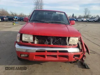 1999 Nissan Frontier XE with VIN 1N6ED26Y2XC312863, listed as a Copart auction lot 42259015 with 212,666 mi miles and Salvage title. Bid and sale history available at DreamBid. Image 5.