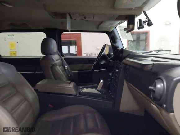 2005 Hummer H2 SUV with VIN 5GRGN23U65H132505, listed as a IAAI auction lot 41515346 with 140,944 mi miles. Bid and sale history available at carsss.com. Image 5.