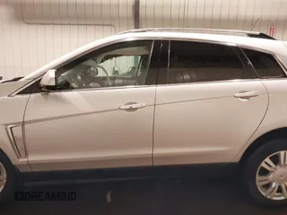 2016 Cadillac SRX Luxury Collection with VIN 3GYFNEE3XGS566210, listed as a IAAI auction lot 42094984 with 99,671 mi miles and . Bid and sale history available at DreamBid. Image 14.