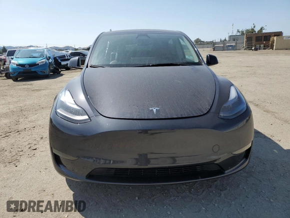 2024 Tesla Model Y Long Range with VIN 7SAYGAEE2RF101616, listed as a Copart auction lot 62236425 with 32,619 mi miles and Salvage title. Bid and sale history available at DreamBid. Image 5.
