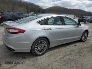 2016 Ford Fusion Titanium with VIN 3FA6P0K99GR319253, listed as a Copart auction lot 51935965 with 186,717 mi miles and Salvage Title. Bid and sale history available at DreamBid. Image 3.