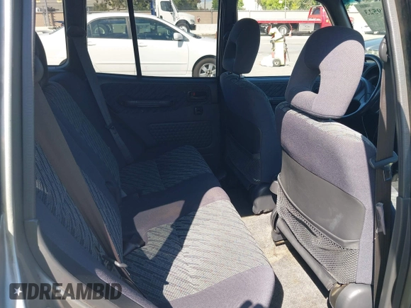 2000 Toyota RAV4 z VIN JT3GP10V5Y7065431, wystawiony jako IAAI lot #42639523 z przebiegiem 262 038 mil mil oraz . Historia ofert i sprzedaży dostępna na DreamBid. Obrazek 8.