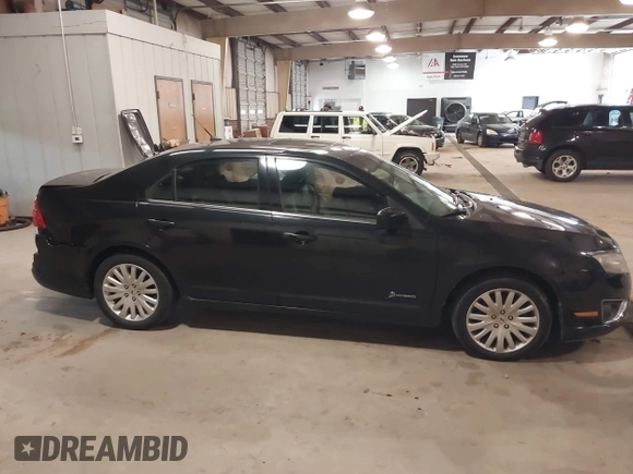 2010 Ford Fusion Hybrid with VIN 3FADP0L39AR140087, listed as a IAAI auction lot 41737705 with 118,563 mi miles. Bid and sale history available at carsss.com. Image 13.