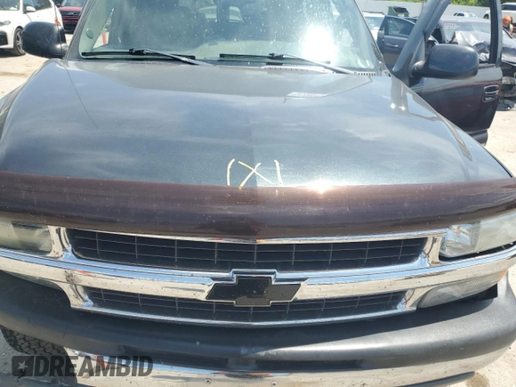 2003 Chevrolet Suburban LT with VIN 1GNFK16Z73J210407, listed as a Copart auction lot 62556615 with 231,529 mi miles and Salvage title. Bid and sale history available at DreamBid. Image 12.
