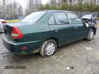 1998 Mitsubishi Mirage DE z VIN JA3AY26A2WU042095, wystawiony jako Copart lot #84700394 z przebiegiem 124 362 mil mil oraz Czysty tytuł • Clean title. Historia ofert i sprzedaży dostępna na DreamBid. Obrazek 3.