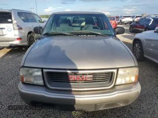 2000 GMC Sonoma SLS z VIN 1GTCS19W3Y8158978, wystawiony jako Copart lot #74180564 z przebiegiem Nie podano mil oraz Szkody całkowita. Historia ofert i sprzedaży dostępna na DreamBid. Obrazek 5.
