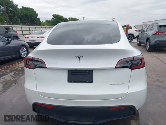 2022 Tesla Model Y Long Range z VIN 7SAYGDEE2NF420882, wystawiony jako IAAI lot #42023642 z przebiegiem 19 783 mil mil oraz . Historia ofert i sprzedaży dostępna na DreamBid. Obrazek 16.