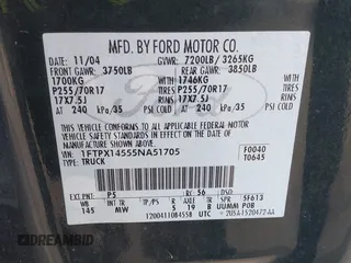 2005 Ford F-150 XLT with VIN 1FTPX14555NA51705, listed as a IAAI auction lot 42098365 with 162,409 mi miles. Bid and sale history available at carsss.com. Image 9.
